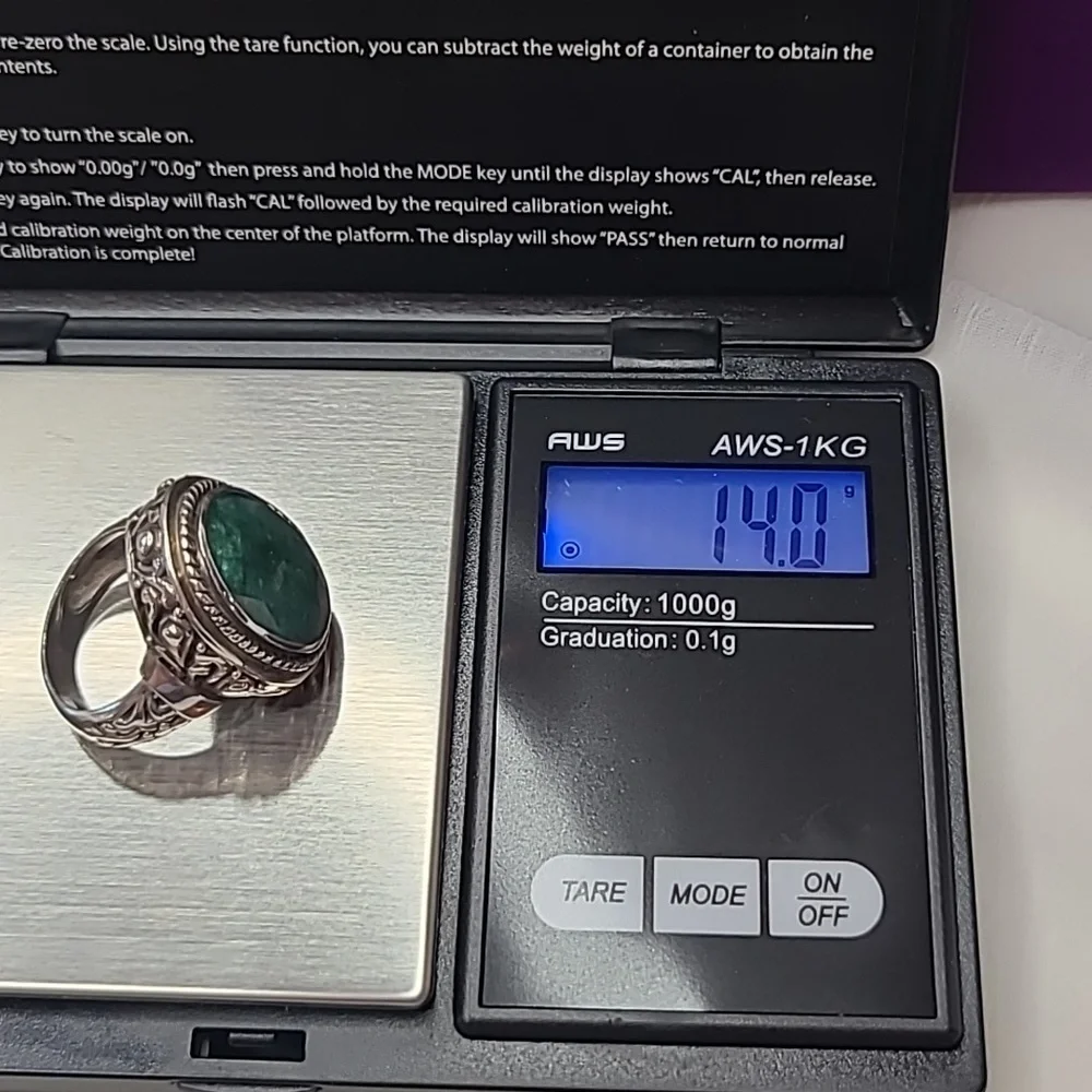 Emerald Oval Cut Sterling Silver Ring